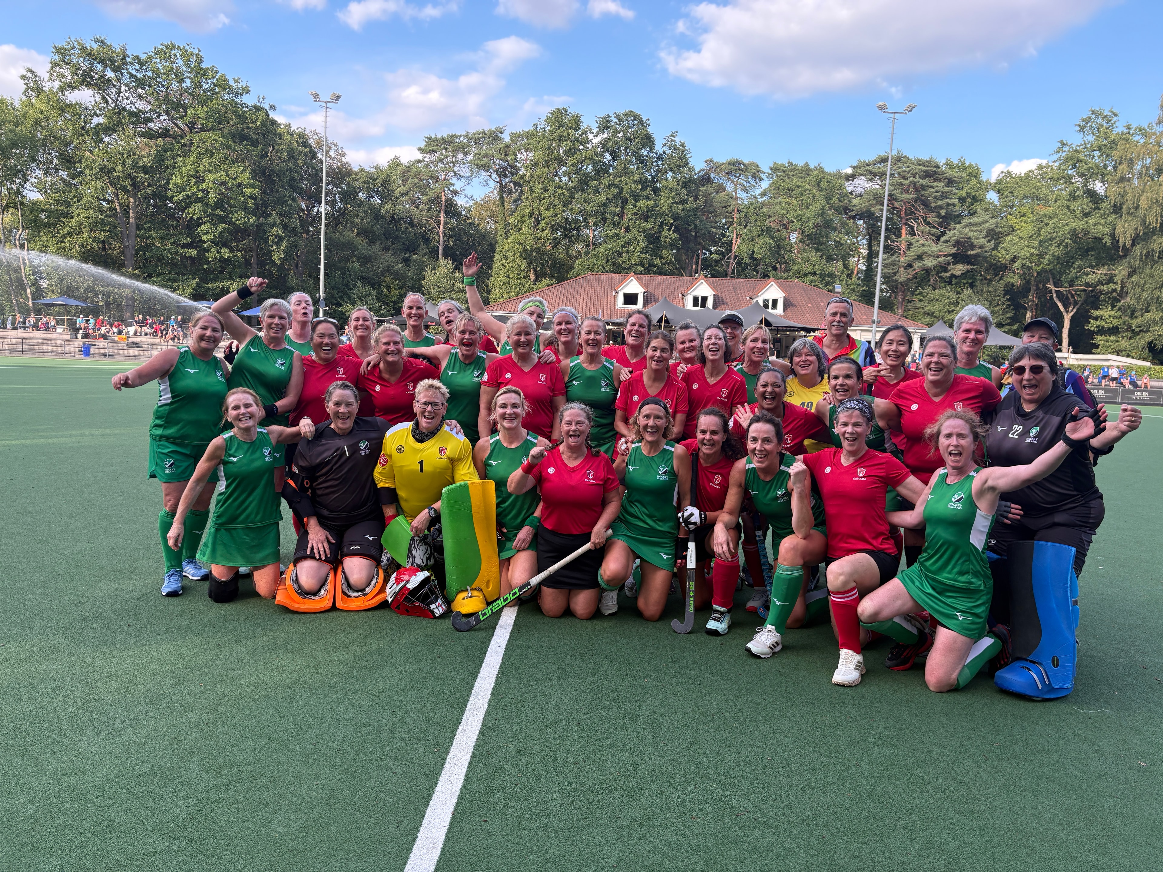 Ireland and Wales teams pose together on the pitch at World Cup 2026